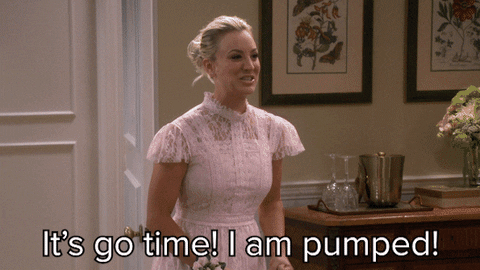 GIF from a tv show called "The Big Bang Theory". Women in a bridal party jumping up excitedly and saying: "It's go time! I am Pumped!", then running away. 